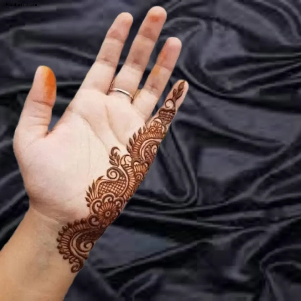 back hand flower mehndi design