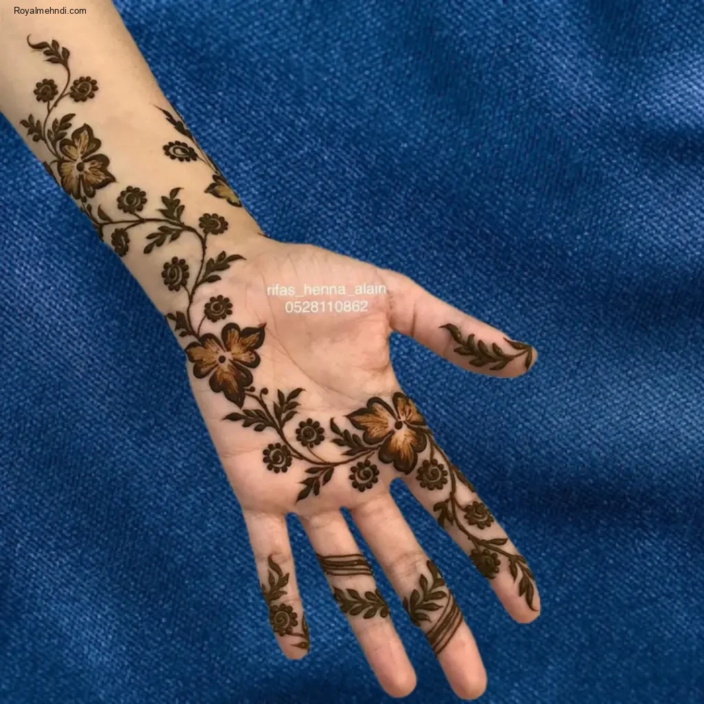 back hand flower mehndi design