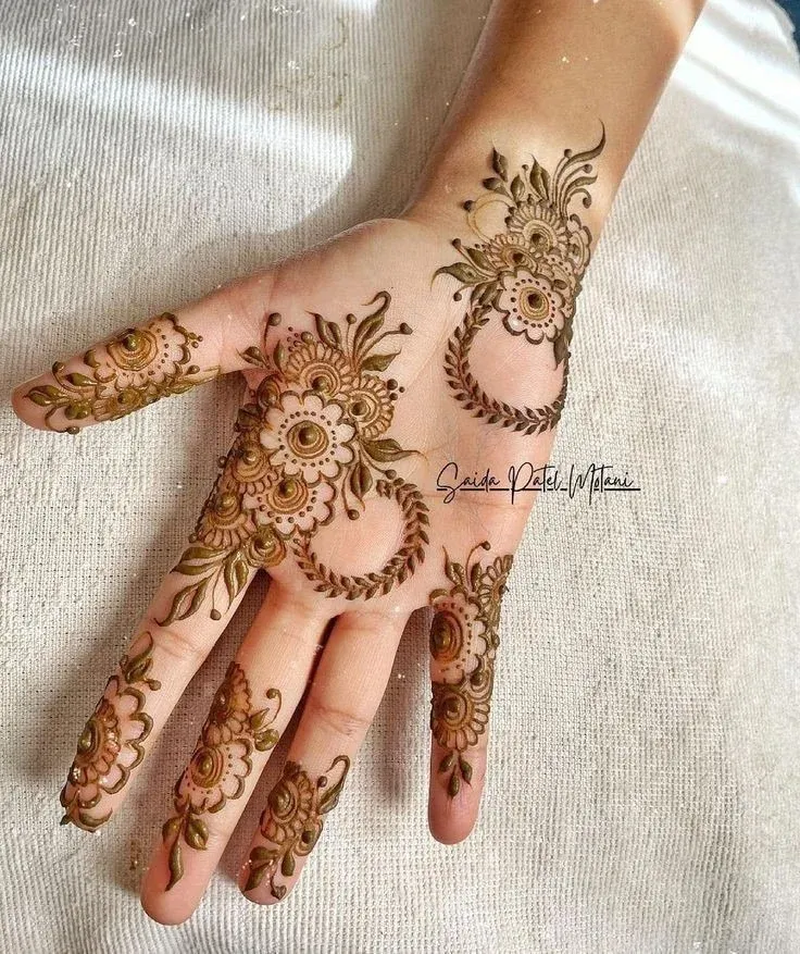 Royal Front Hand Mehndi Design idea